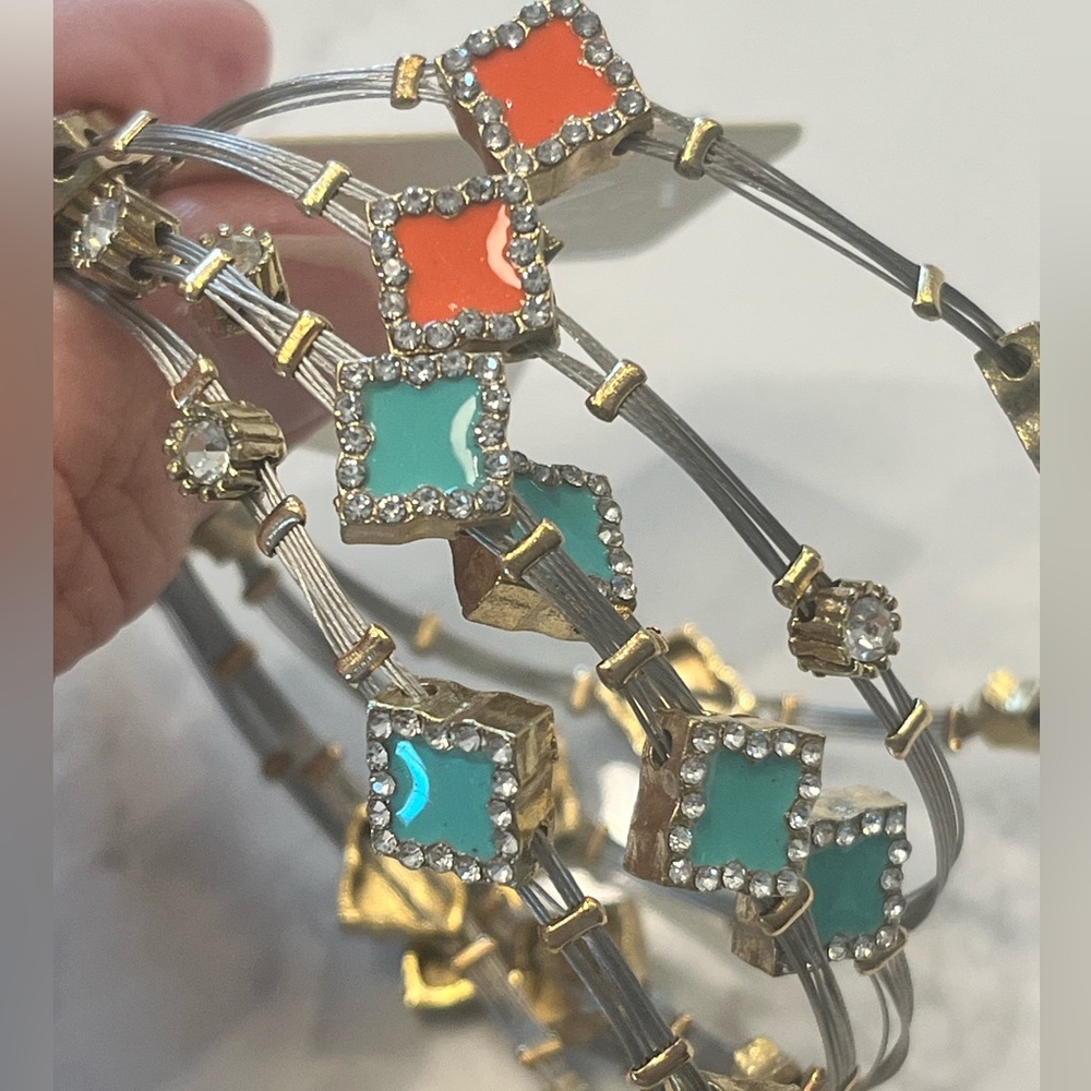 NWTs Turquoise and Coral colored 2Tone Multistrand Clover Bracelet